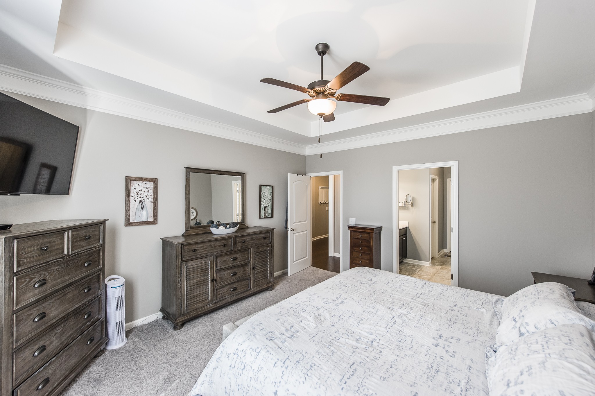 114 Monteview Drive Hendersonville, TN 37075 - Photo 24 of 42 a spacious bedroom with a bed and dresser