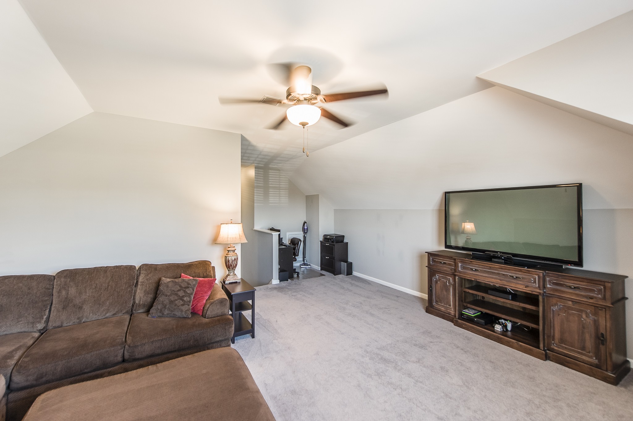 114 Monteview Drive Hendersonville, TN 37075 - Photo 30 of 42 a living room with furniture and a flat screen tv