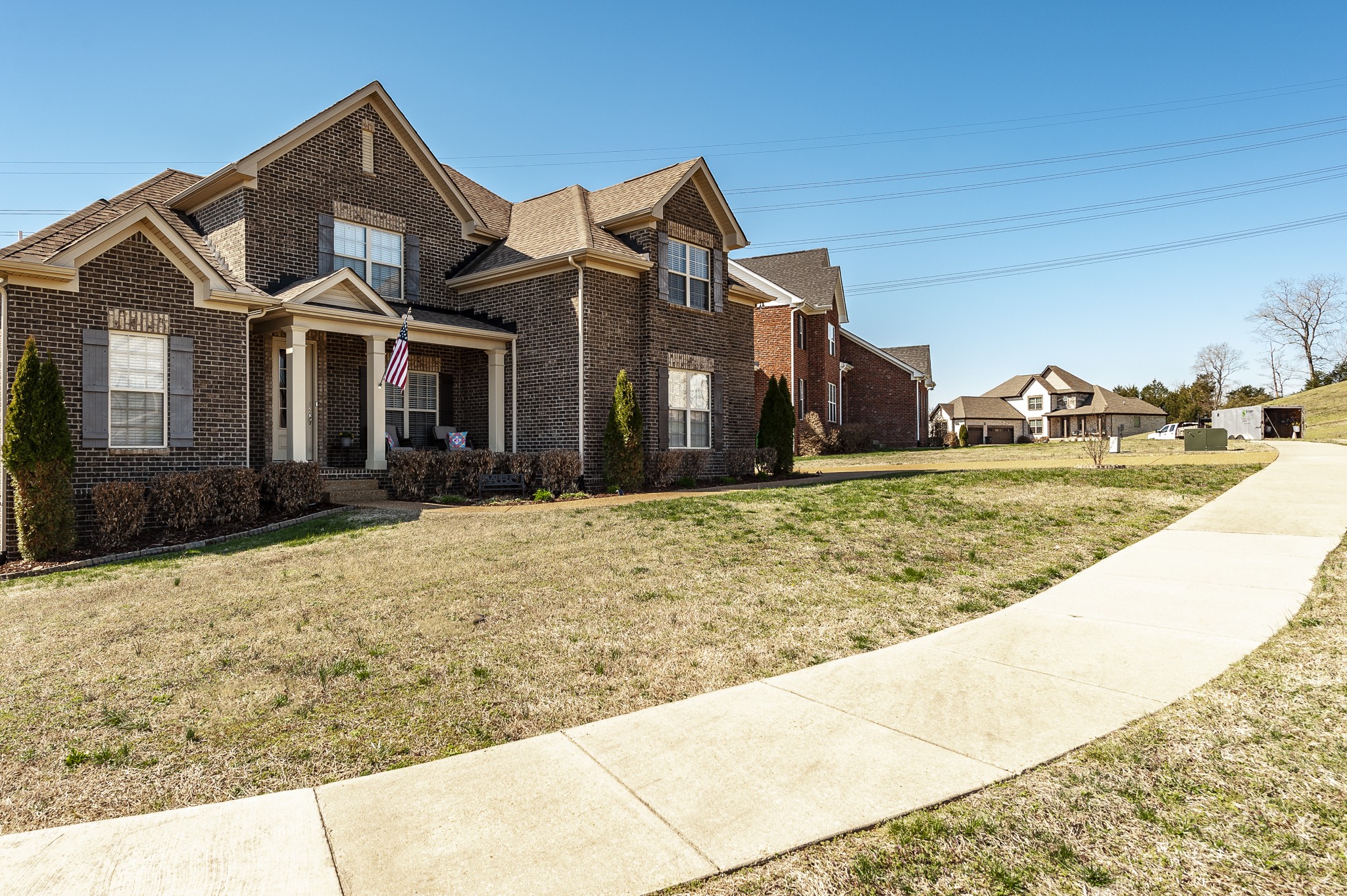 114 Monteview Drive Hendersonville, TN 37075 - Photo 3 of 42 a front view of a house with a yard