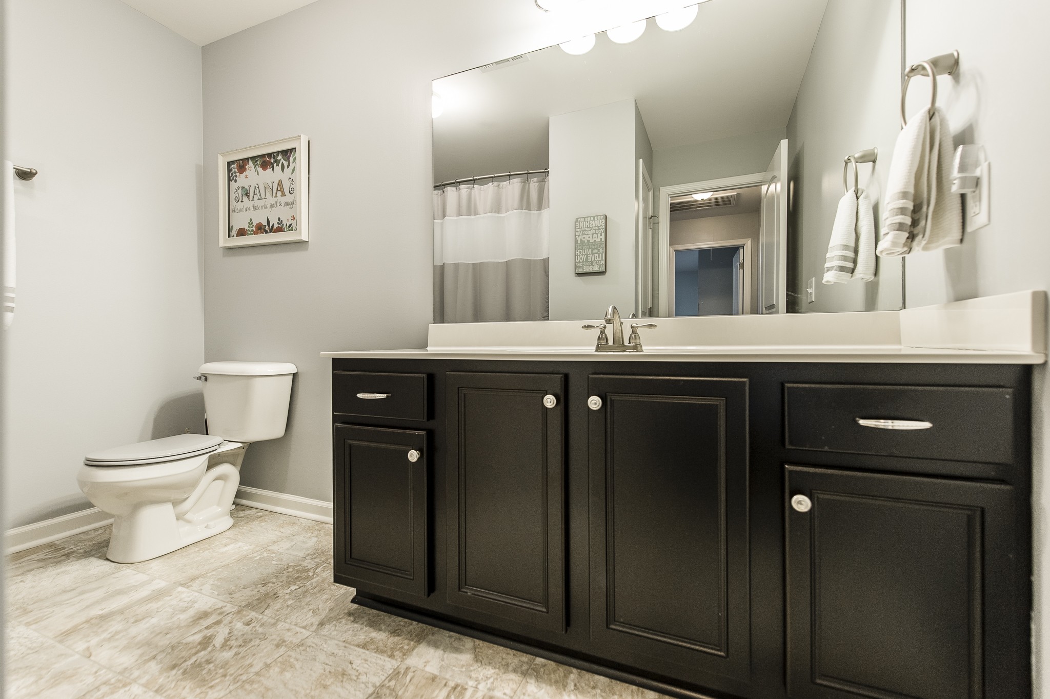 114 Monteview Drive Hendersonville, TN 37075 - Photo 33 of 42 a bathroom with a toilet sink and mirror