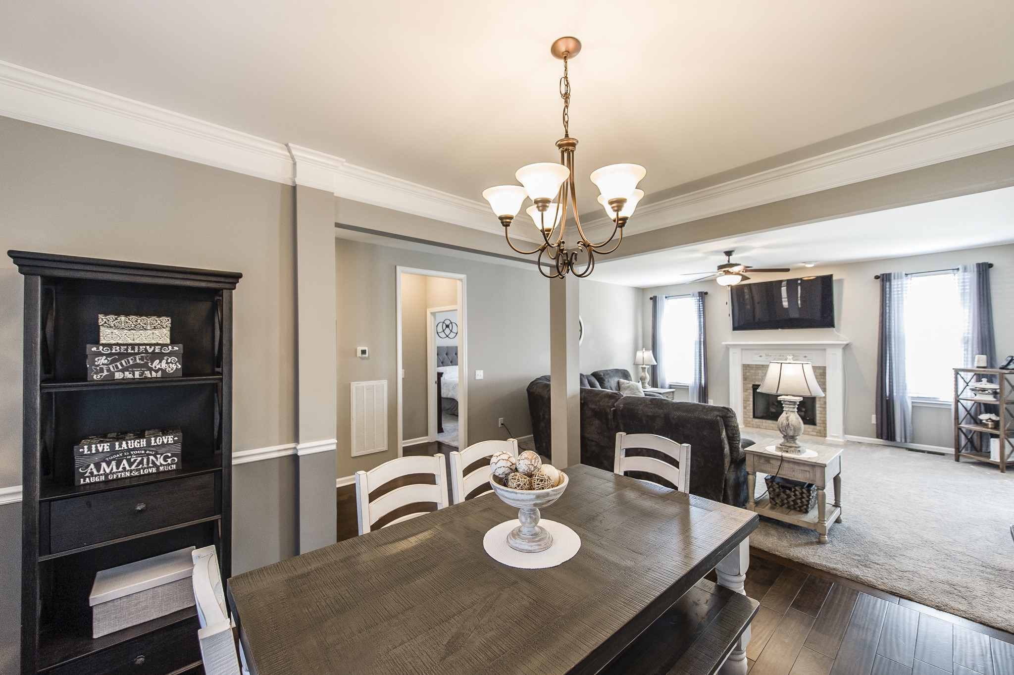 114 Monteview Drive Hendersonville, TN 37075 - Photo 9 of 42 a view of a dining room with furniture a chandelier and wooden floor