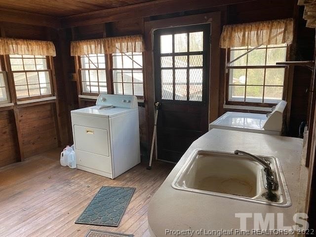 838 Jada Allen Road Dunn, NC 28334 - Photo 12 of 25 a utility room with dryer and washer