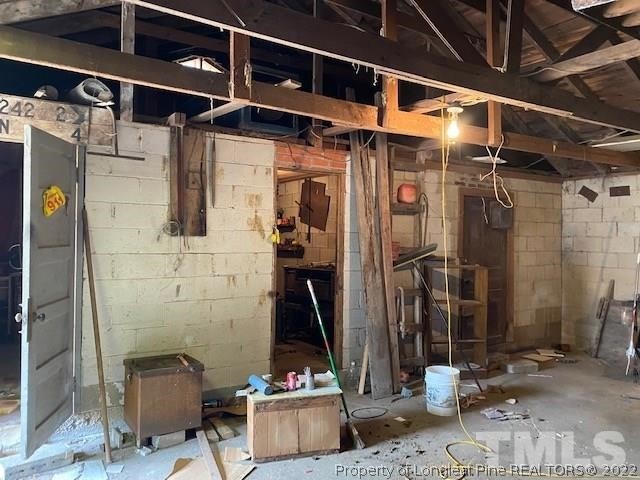 838 Jada Allen Road Dunn, NC 28334 - Photo 16 of 25 a view of a storage room