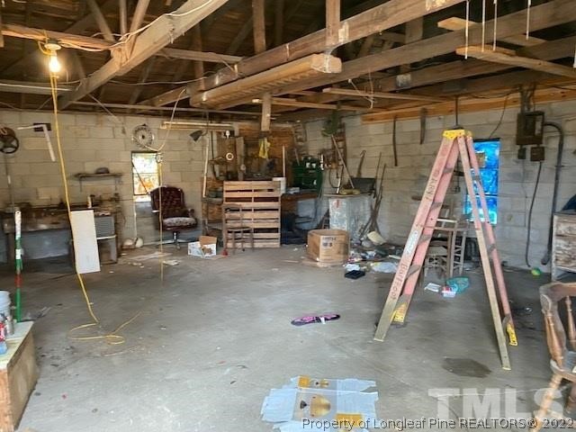 838 Jada Allen Road Dunn, NC 28334 - Photo 17 of 25 a view of a room with gym equipment