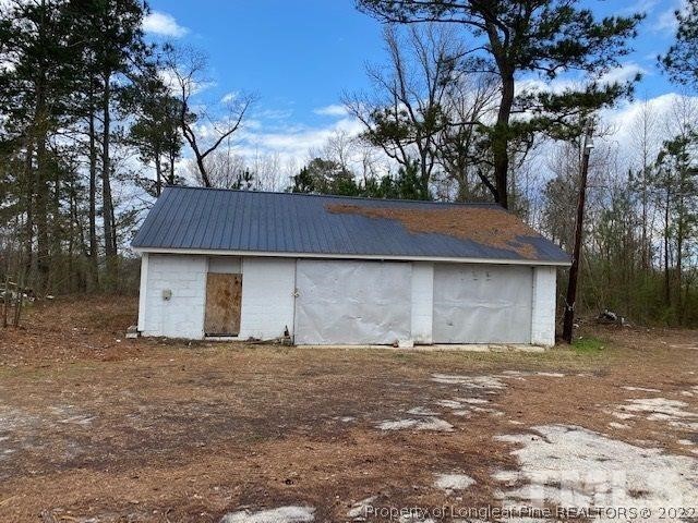 838 Jada Allen Road Dunn, NC 28334 - Photo 20 of 25 a front view of a house with a yard