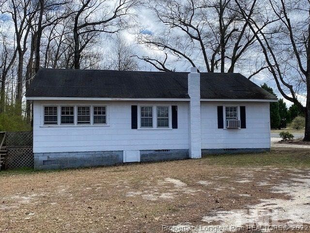 838 Jada Allen Road Dunn, NC 28334 - Photo 24 of 25 front view of a house with a large tree