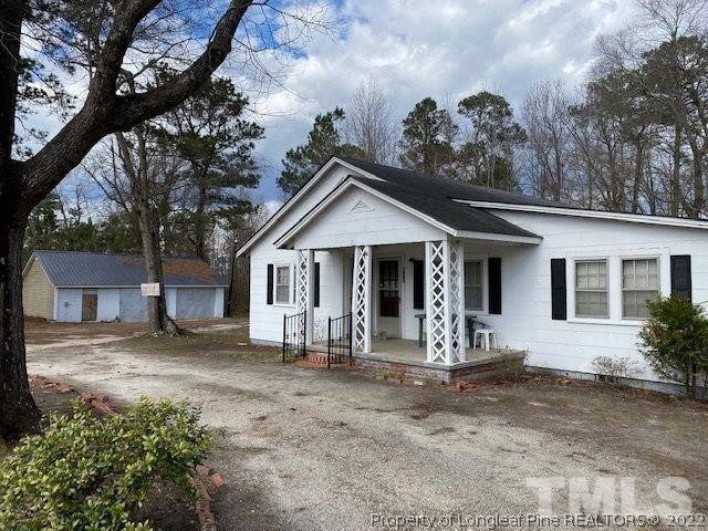 838 Jada Allen Road Dunn, NC 28334 - Photo 25 of 25 a front view of a house with garden