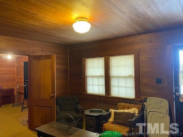838 Jada Allen Road Dunn, NC 28334 - Photo 5 of 25 a room with furniture and a window