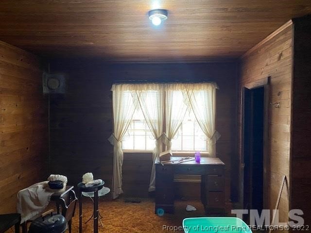 838 Jada Allen Road Dunn, NC 28334 - Photo 6 of 25 a living room with furniture and a window