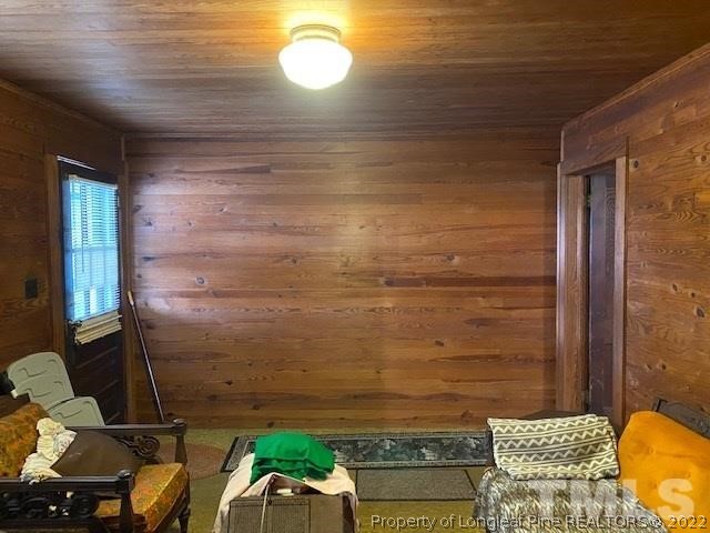 838 Jada Allen Road Dunn, NC 28334 - Photo 9 of 25 a view of balcony with wooden floor
