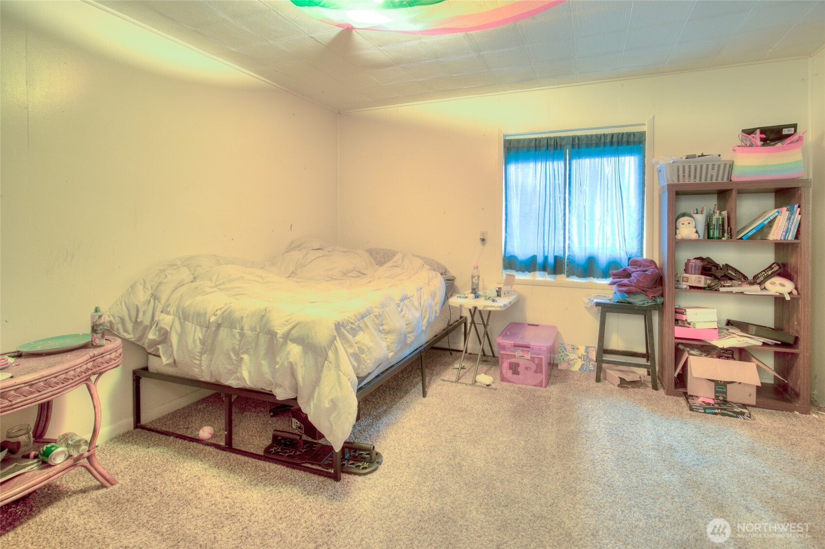 102 Elma Street Copalis Beach, WA 98535 - Photo 17 of 23 a bedroom with a bed and a table