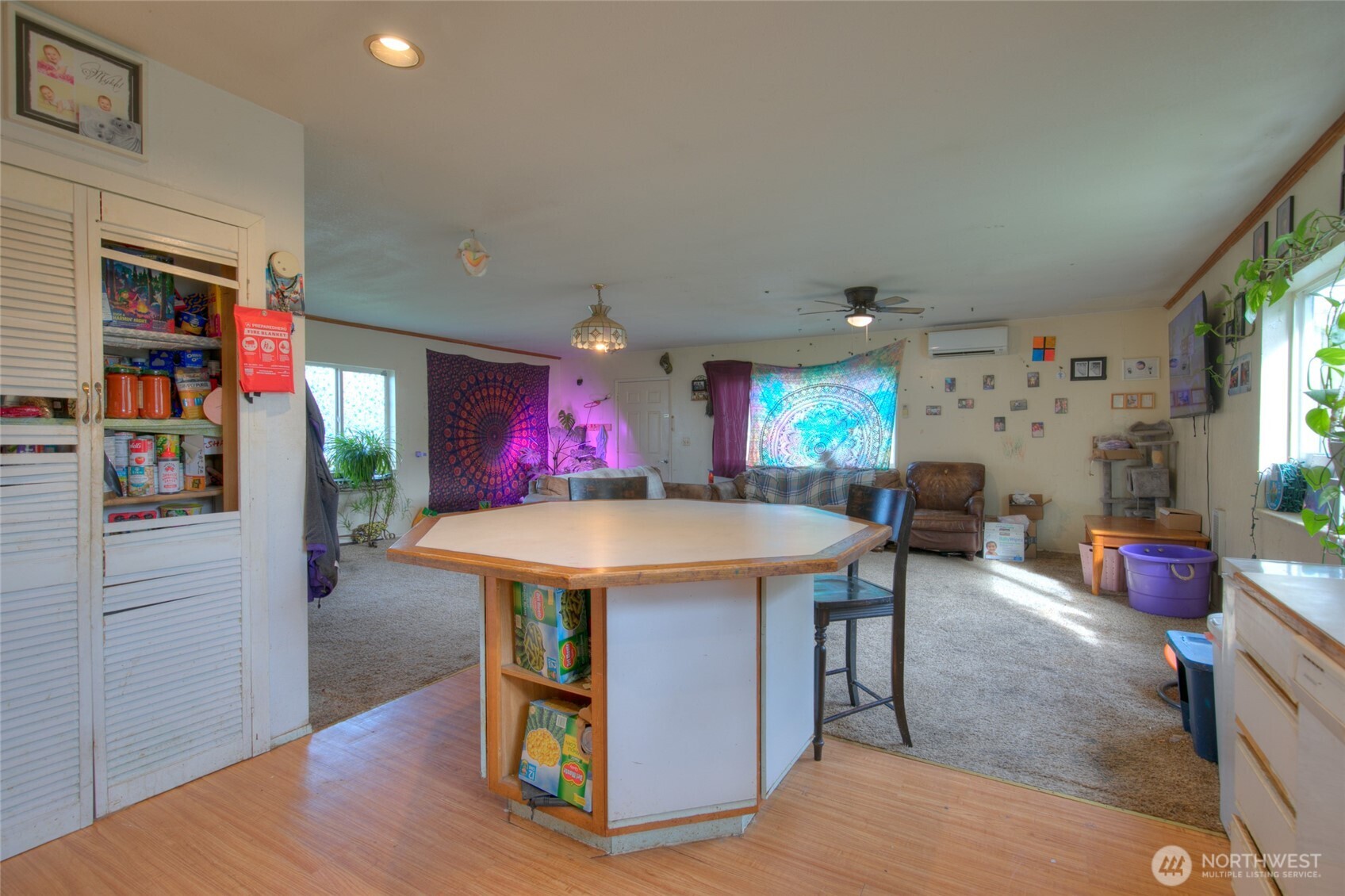 102 Elma Street Copalis Beach, WA 98535 - Photo 10 of 23 a view of a dining room with furniture window and wooden floor
