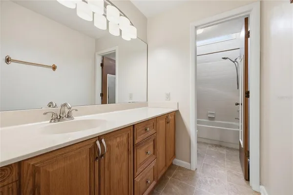 a bathroom with a shower and a toilet
