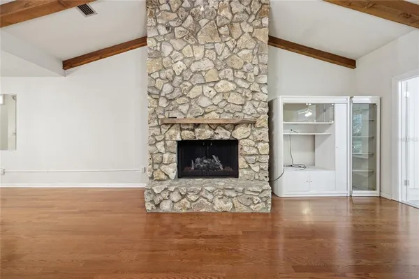 a living room with a fireplace