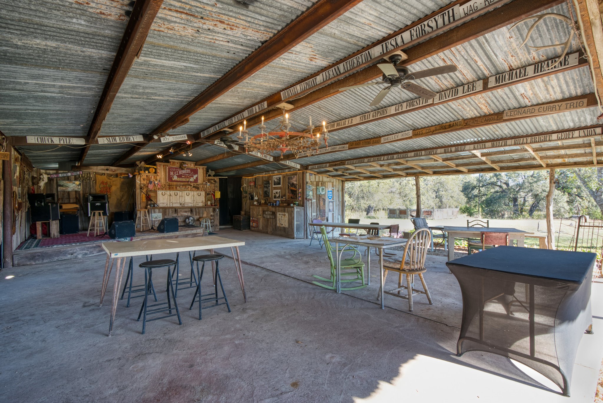 115 Fischer Store Road Fischer, TX 78623 - Photo 12 of 45 a view of a patio with a table and chairs