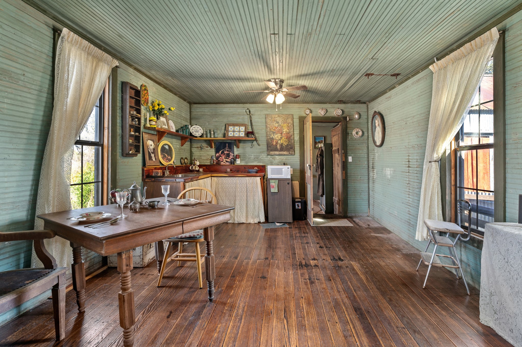 115 Fischer Store Road Fischer, TX 78623 - Photo 23 of 45 a view of a dining room with furniture window and wooden floor