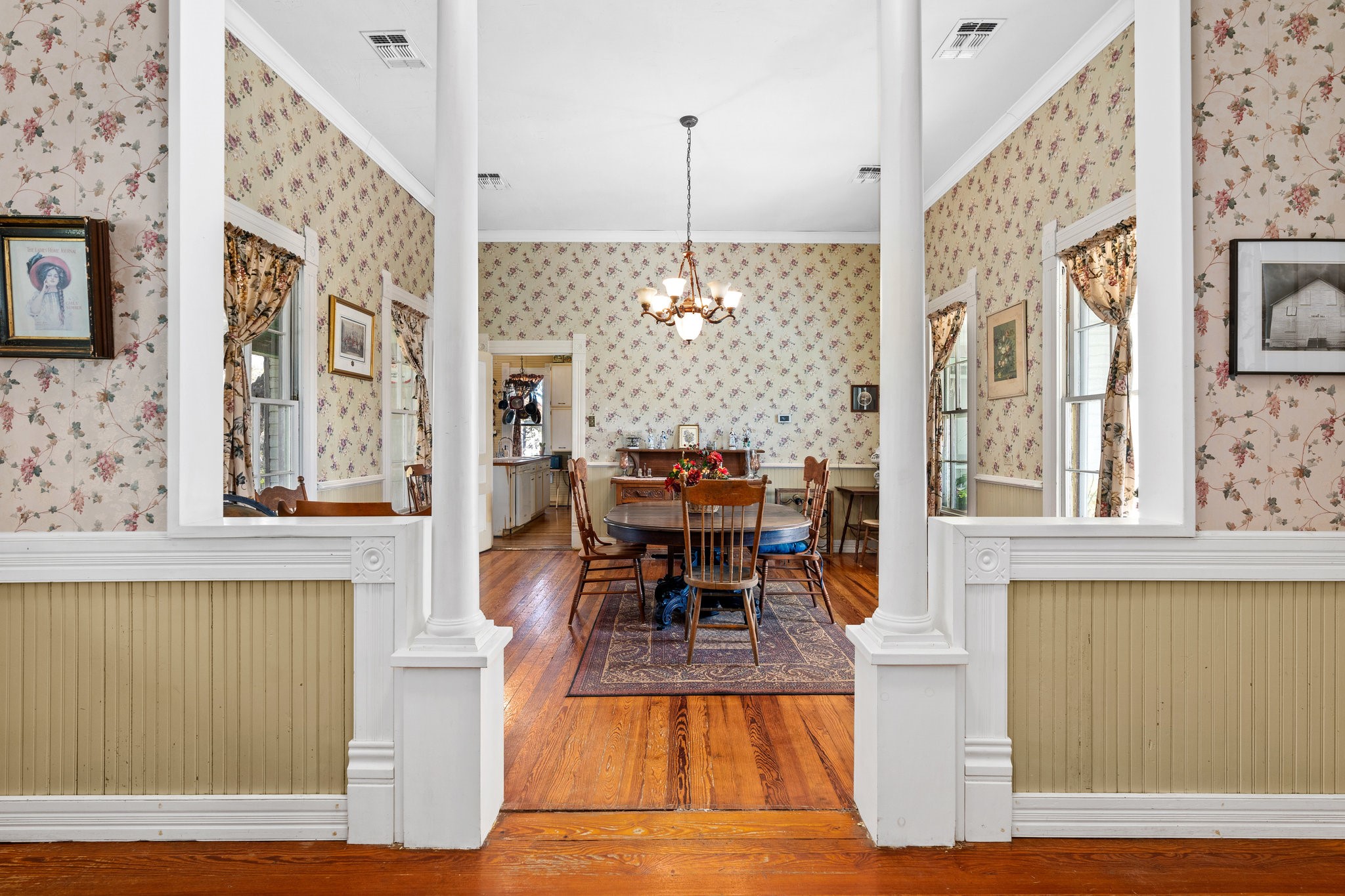 115 Fischer Store Road Fischer, TX 78623 - Photo 32 of 45 a view of a dining room with furniture a chandelier and wooden floor