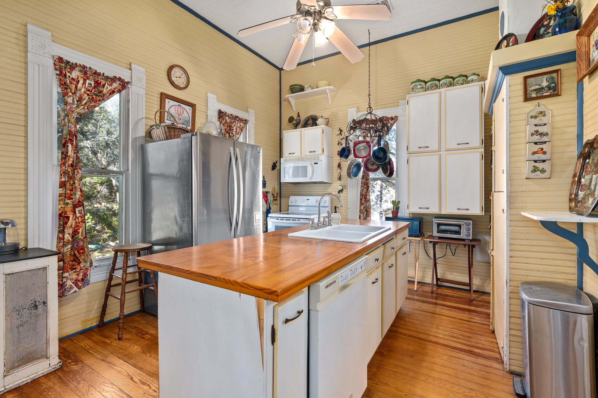 115 Fischer Store Road Fischer, TX 78623 - Photo 36 of 45 a kitchen with stainless steel appliances granite countertop a refrigerator and a stove