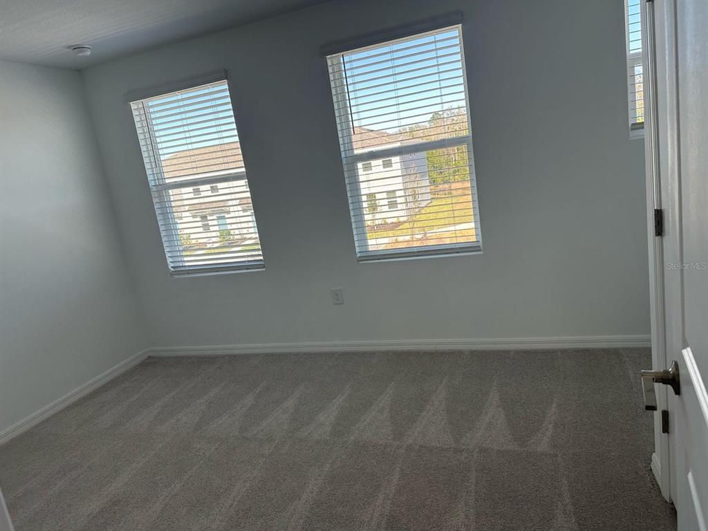 2084 Viewfinder Street Kissimmee, FL 34758 - Photo 16 of 18 an empty room with a window