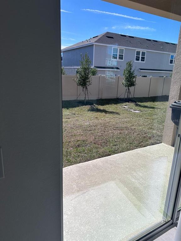 2084 Viewfinder Street Kissimmee, FL 34758 - Photo 18 of 18 a view of a house with a garden
