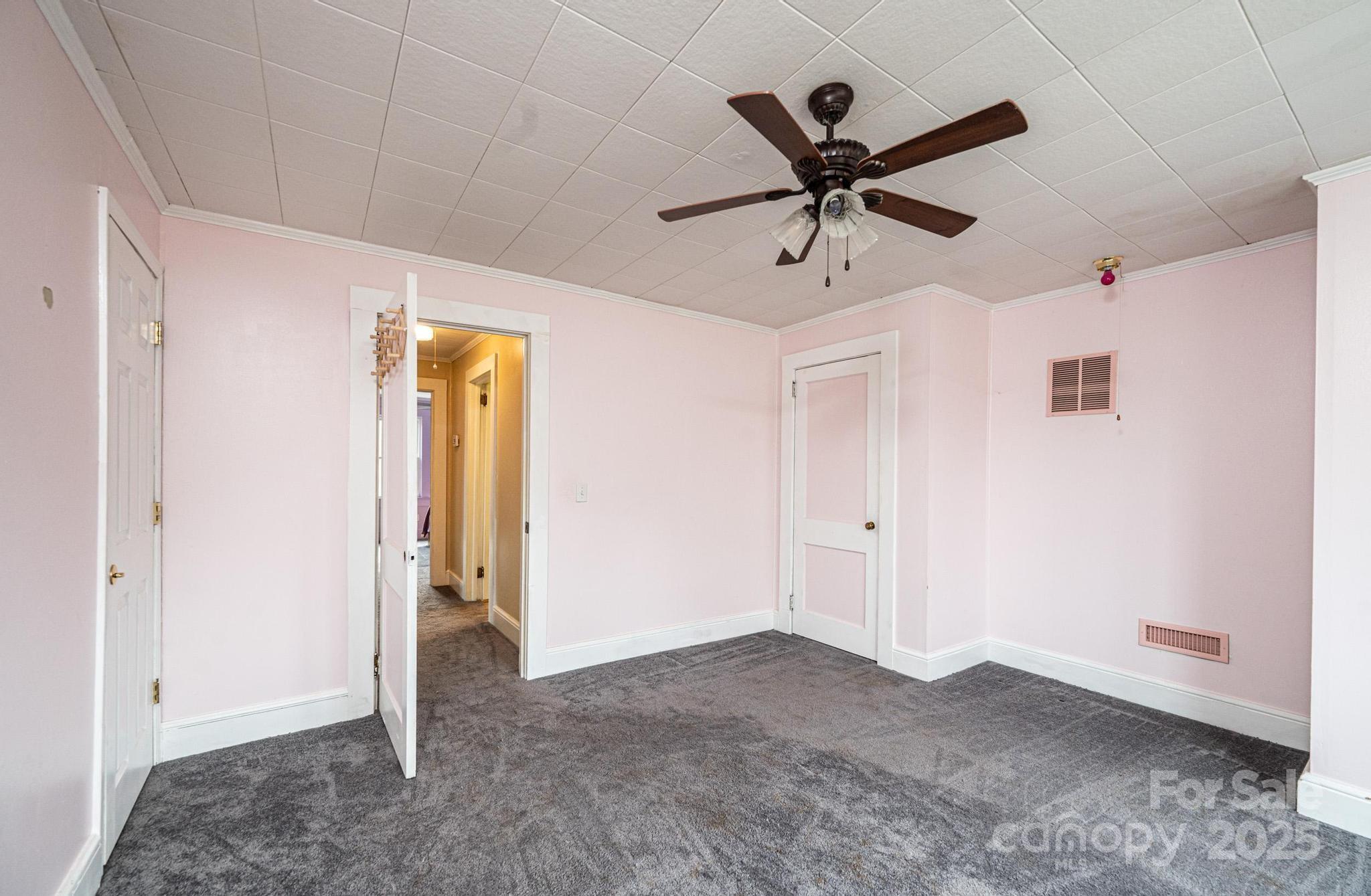 55 Duke Street Granite Falls, NC 28630 - Photo 23 of 45 a view of a livingroom with a ceiling fan & a ceiling fan