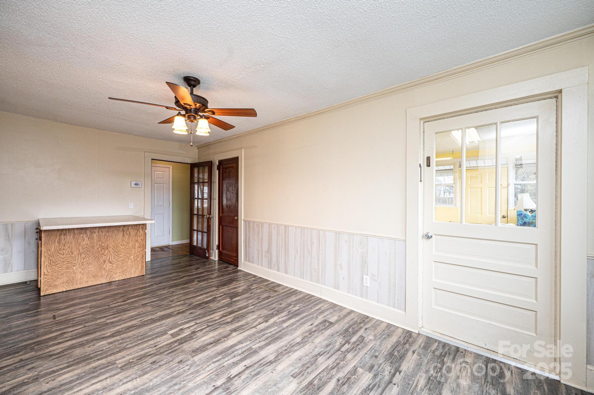 55 Duke Street Granite Falls, NC 28630 - Photo 26 of 45 a view of livingroom with hardwood floor and hallway