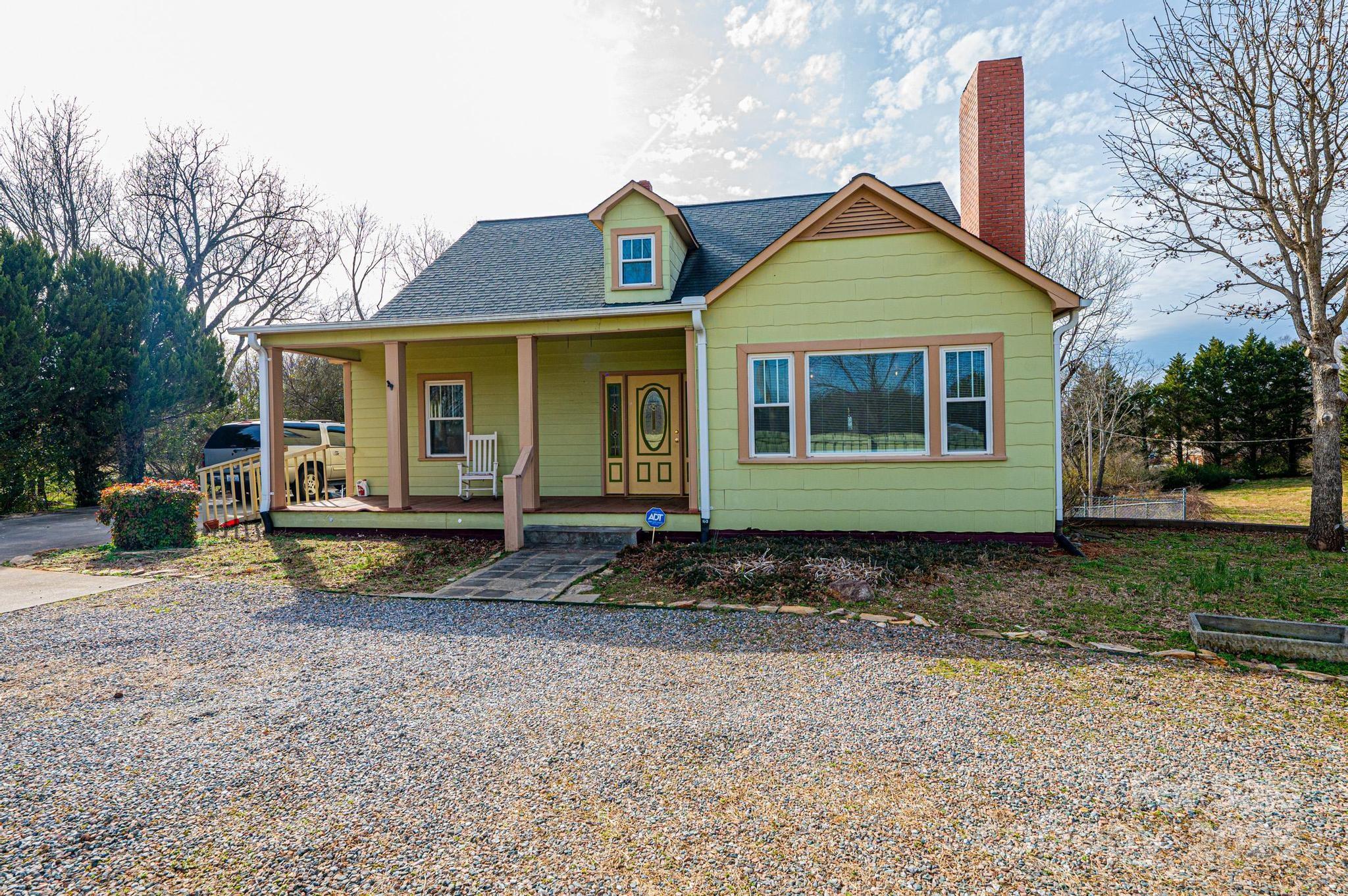 55 Duke Street Granite Falls, NC 28630 - Photo 3 of 45 a view of a house with a yard covered in it