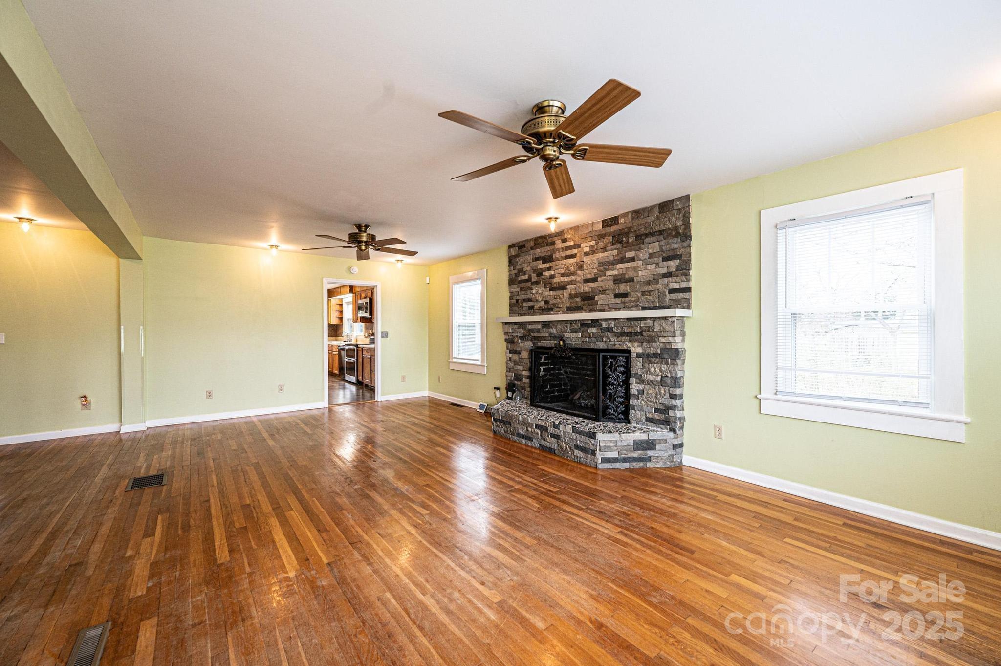 55 Duke Street Granite Falls, NC 28630 - Photo 7 of 45 a view of a livingroom with a fireplace and window