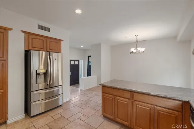 a view of a livingroom with wooden floor