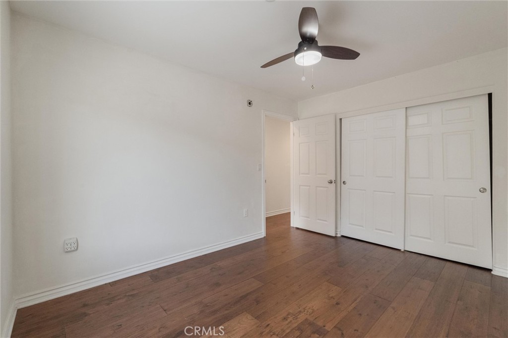 1259 Gonzales Road Simi Valley, CA 93063 - Photo 32 of 39 a view of an empty room and chandelier fan