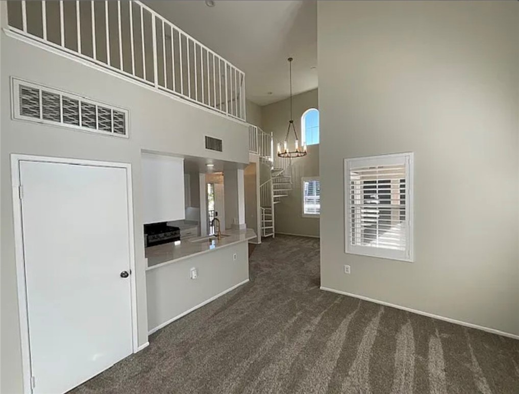 20000 Plum Canyon Road, Unit 225 Saugus, CA 91350 - Photo 9 of 12 a view of a hallway with windows