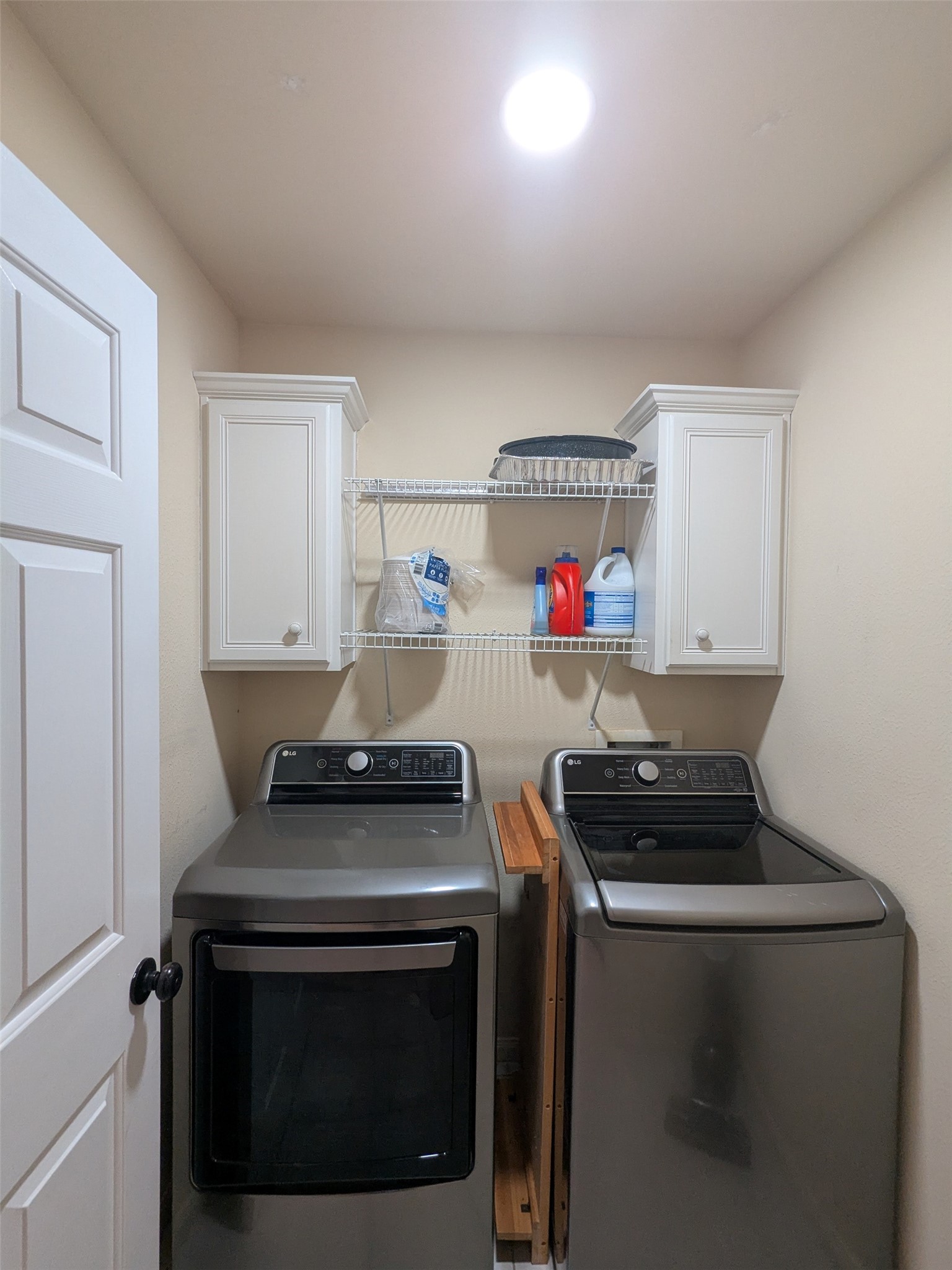 1035 North Colbert Street Dayton, TX 77535 - Photo 10 of 17 Utility room with storage.