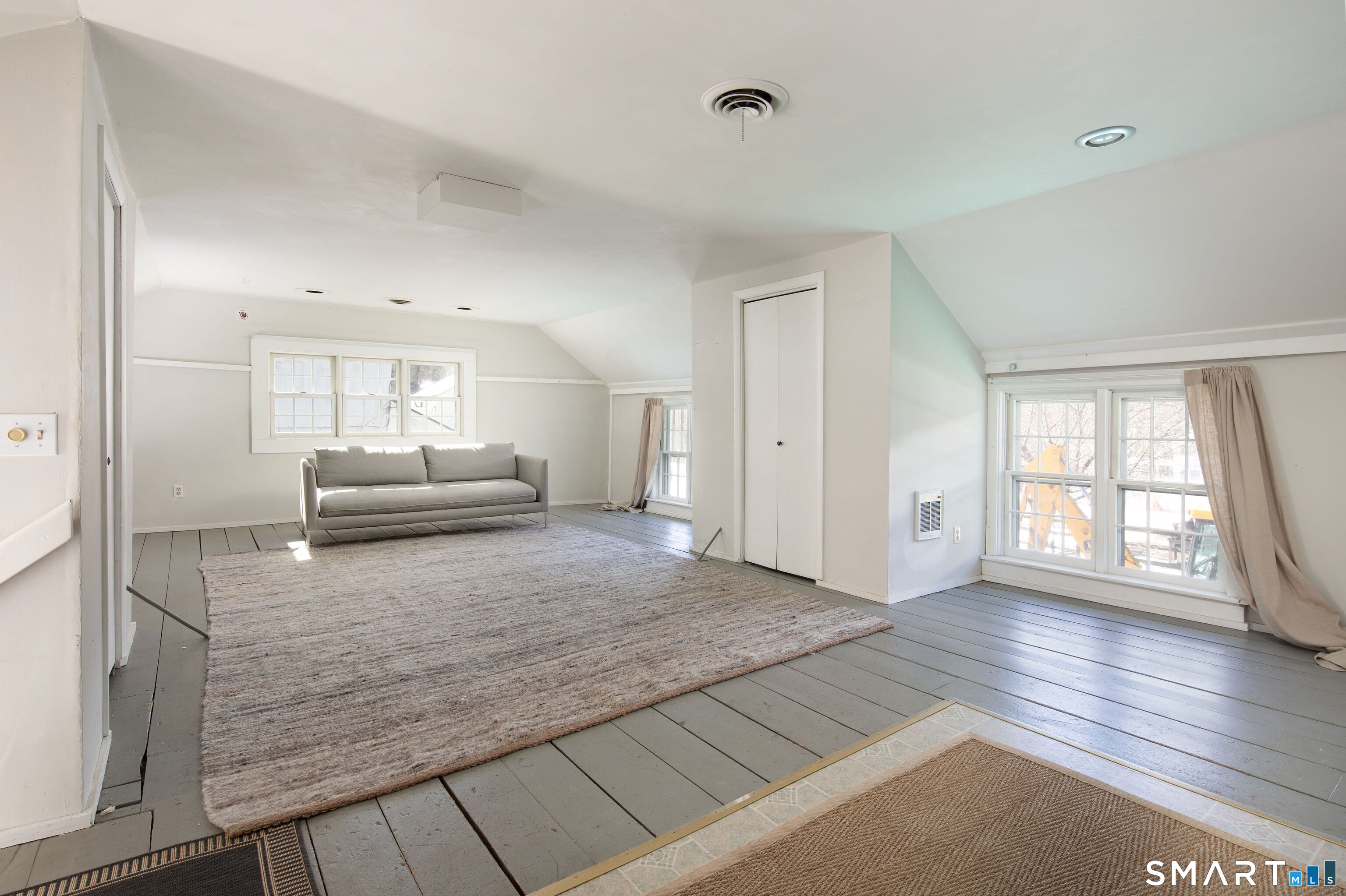 7 Railroad Street Cornwall, CT 06796 - Photo 3 of 8 a view of kitchen and empty room with wooden floor