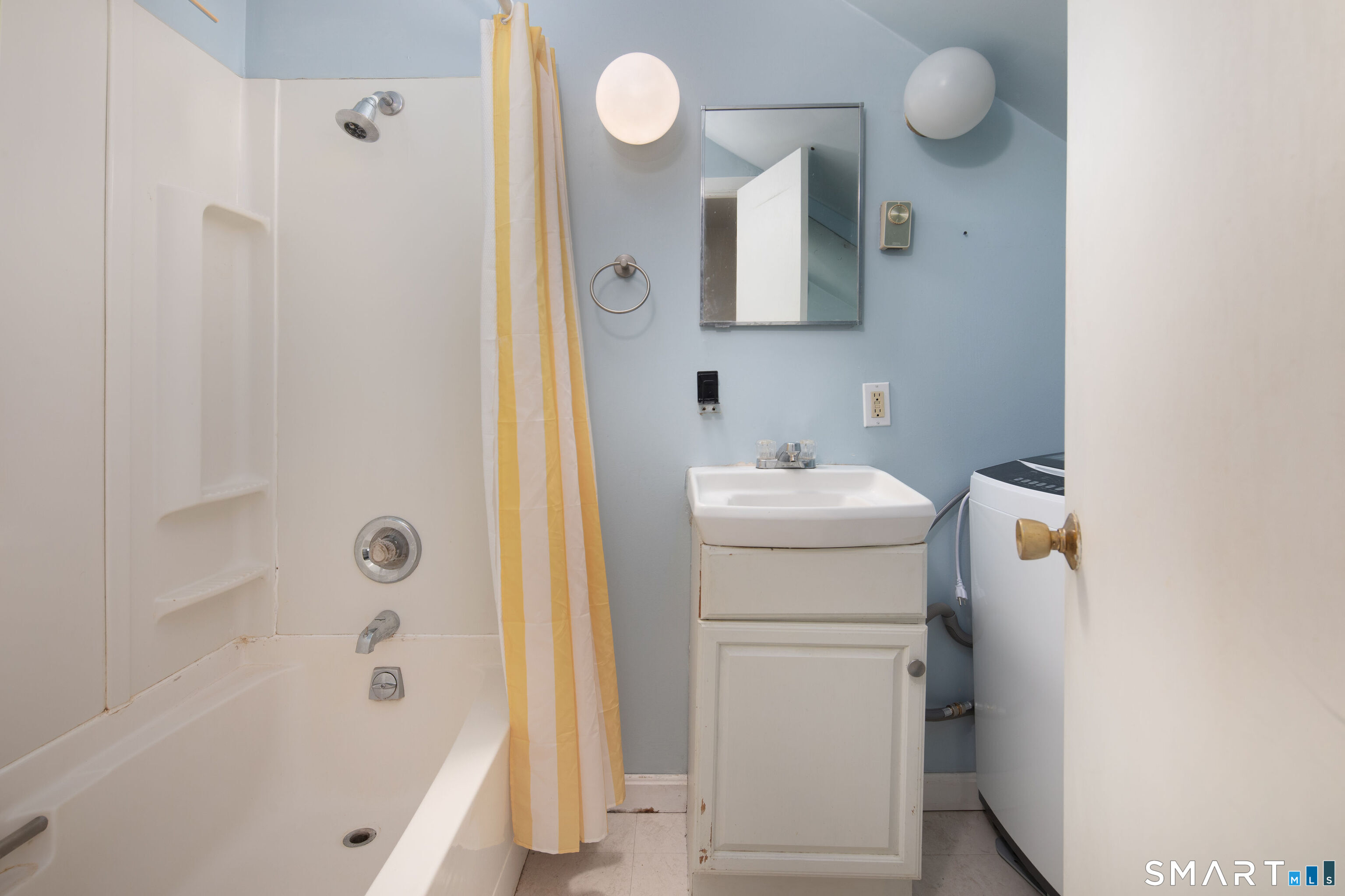 7 Railroad Street Cornwall, CT 06796 - Photo 6 of 8 a bathroom with a sink a toilet and shower