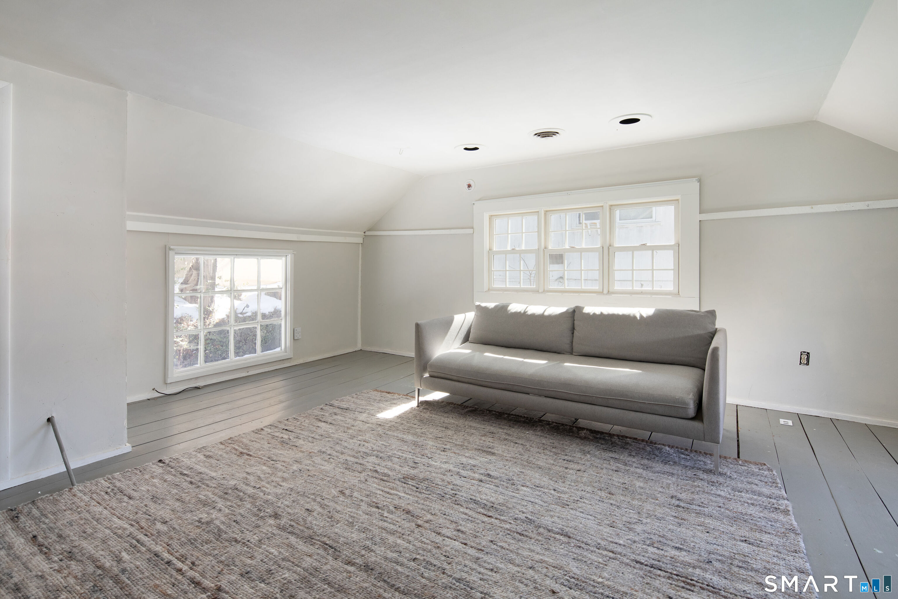 7 Railroad Street Cornwall, CT 06796 - Photo 8 of 8 a living room with furniture and a window