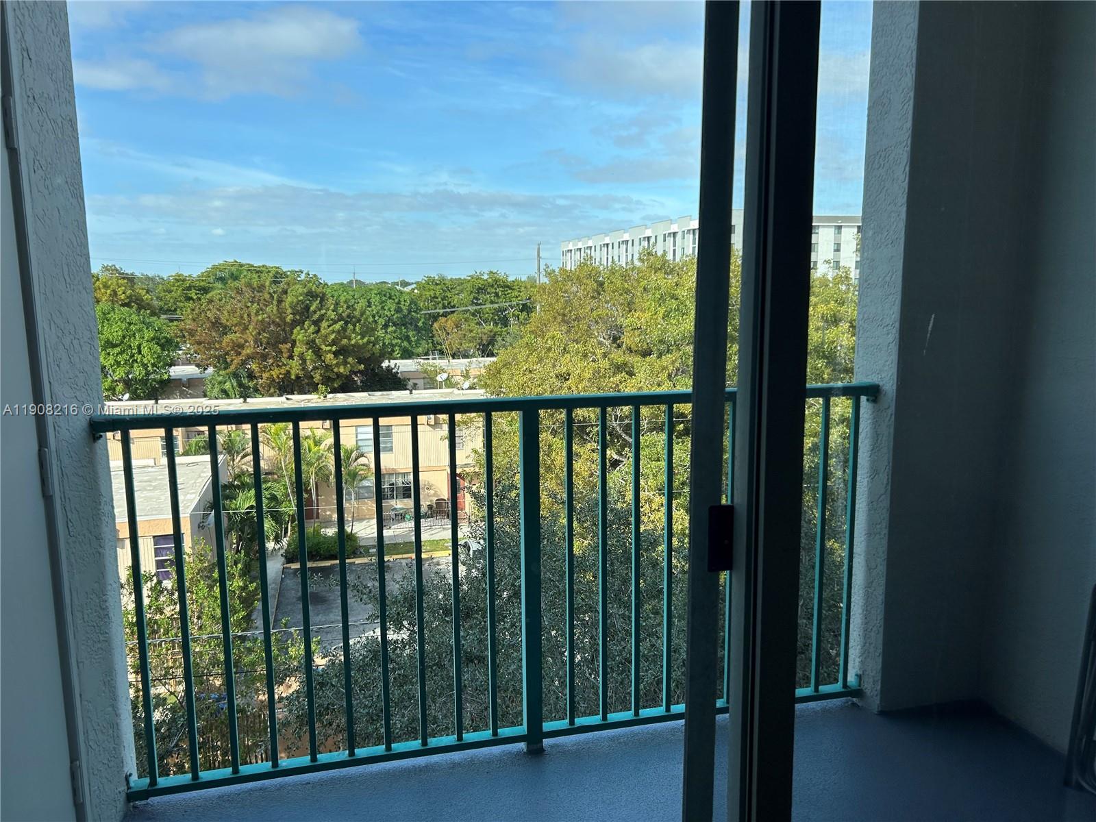 6001 Southwest 70th Street, Unit 551 South Miami, FL 33143 - Photo 20 of 23 a view of outdoor space with balcony