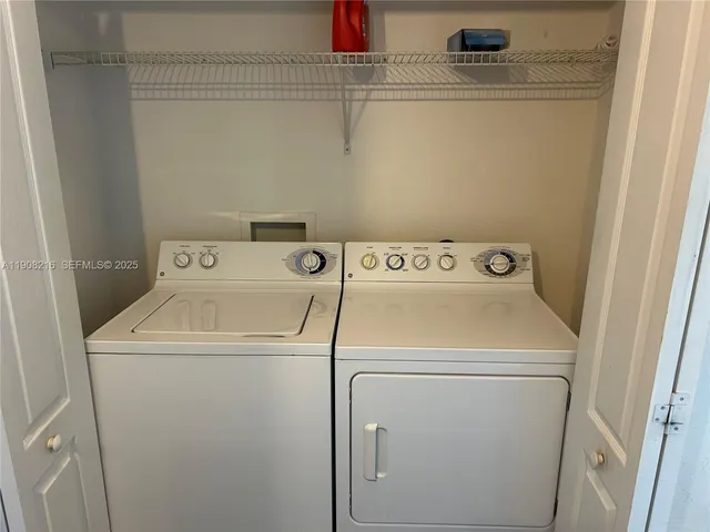 a utility room with dryer and washer