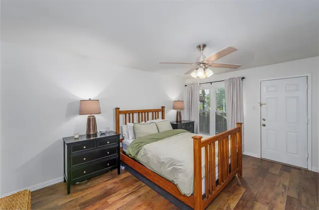 a bed room with a bed and a window