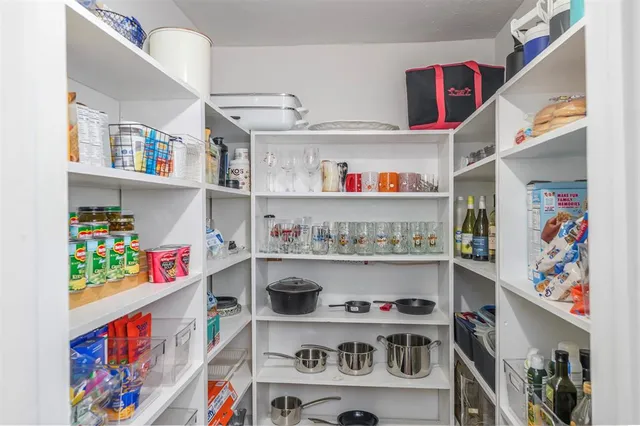 a view of storage and utility room with shelves