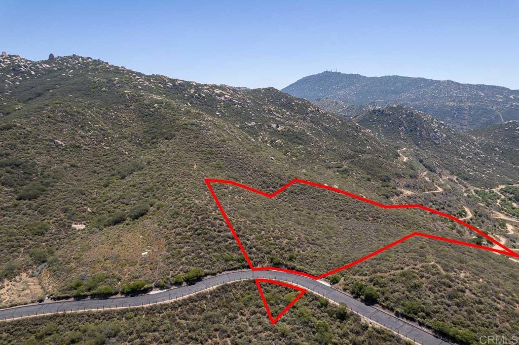 a view of a road with a park