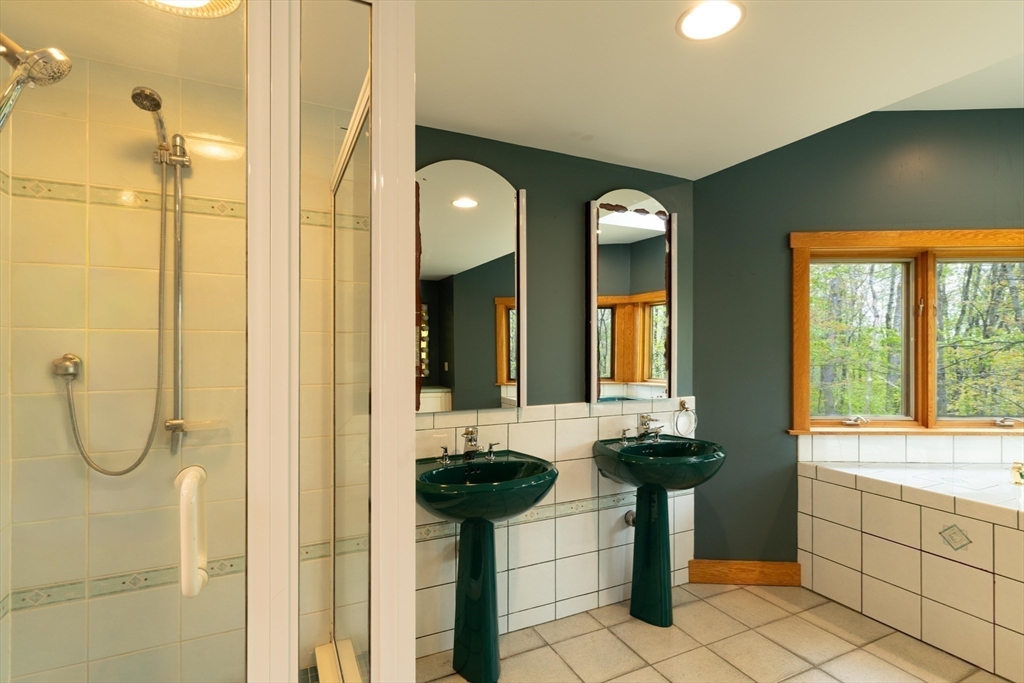 184 W Road Bernardston, MA 01337 - Photo 26 of 41 a bathroom with mirror bathtub and window