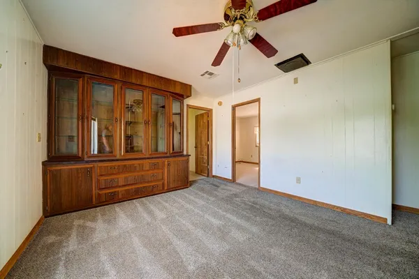 a kitchen with stainless steel appliances granite countertop a sink and cabinets