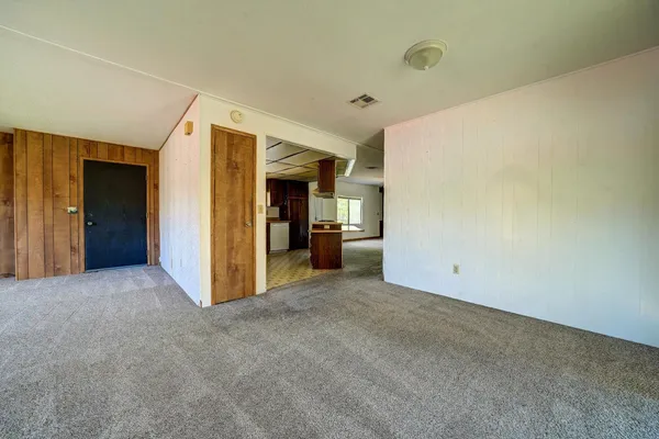 a view of an empty room and window
