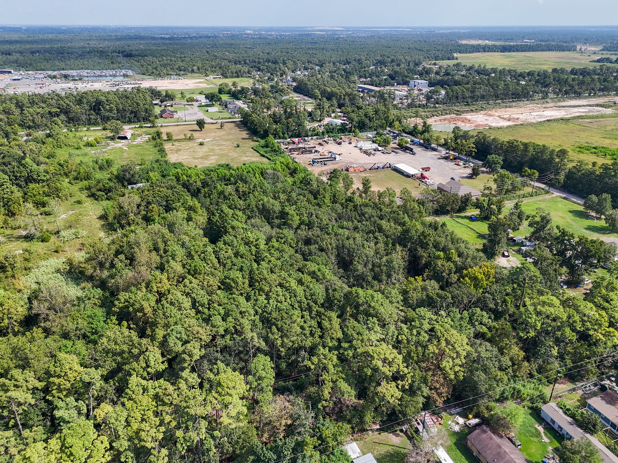 7818 East Mt Houston Road Houston, TX 77050 - Photo 8 of 18 an aerial view of a houses with a yard and lake view