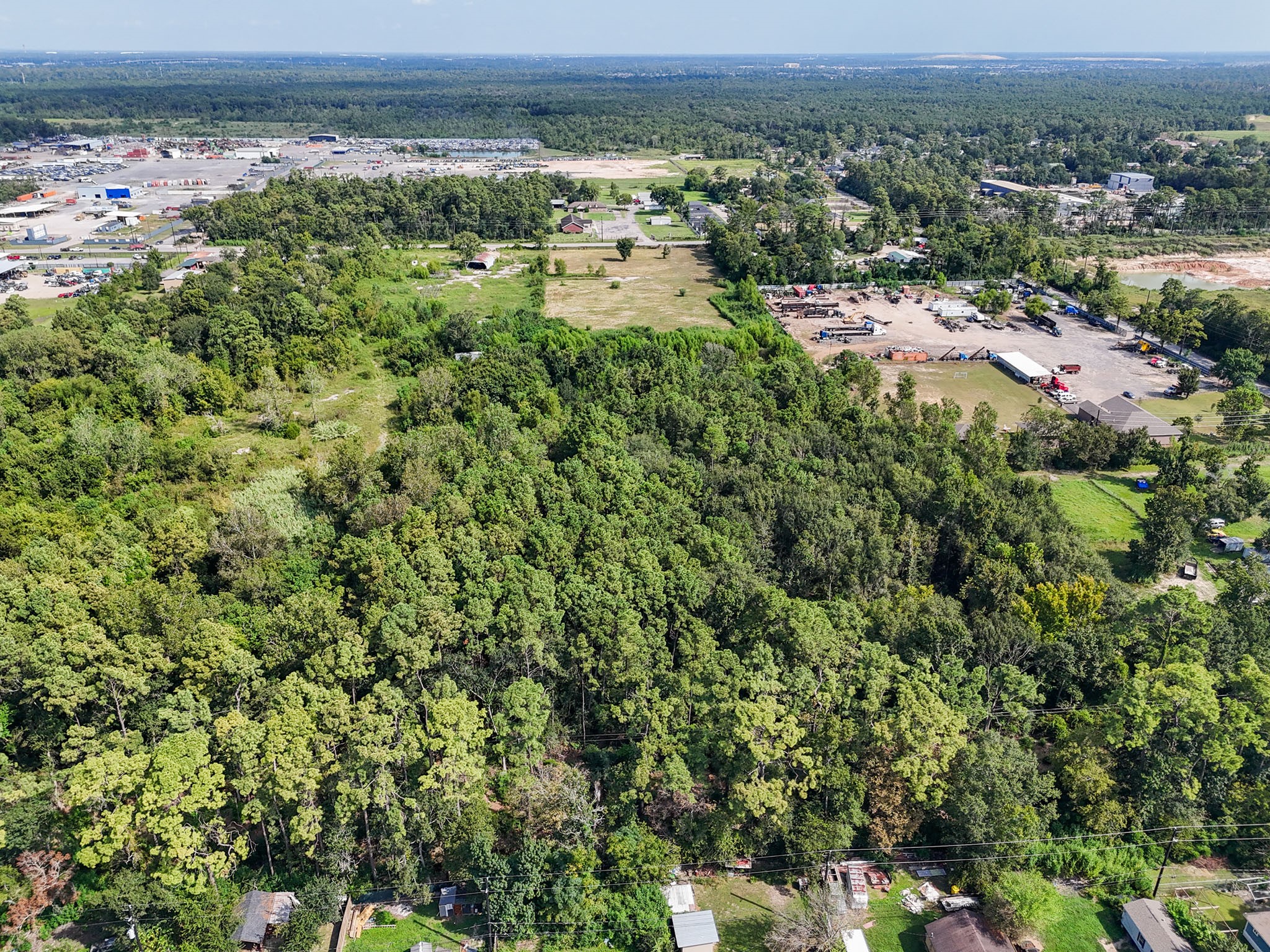 7818 East Mt Houston Road Houston, TX 77050 - Photo 9 of 18 an aerial view of a houses with a yard and lake view