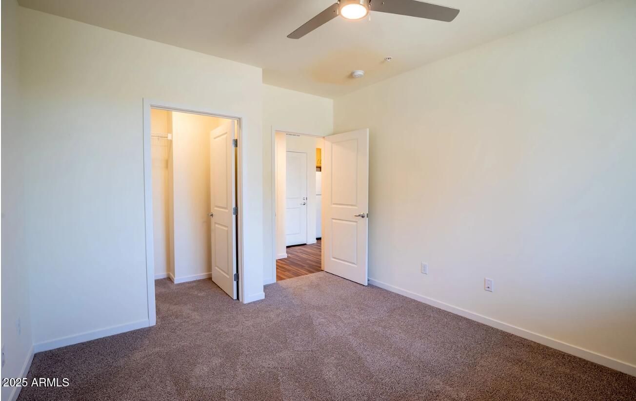 2050 West Southern Avenue, Unit 3 Phoenix, AZ 85041 - Photo 4 of 15 an empty room with a bathroom
