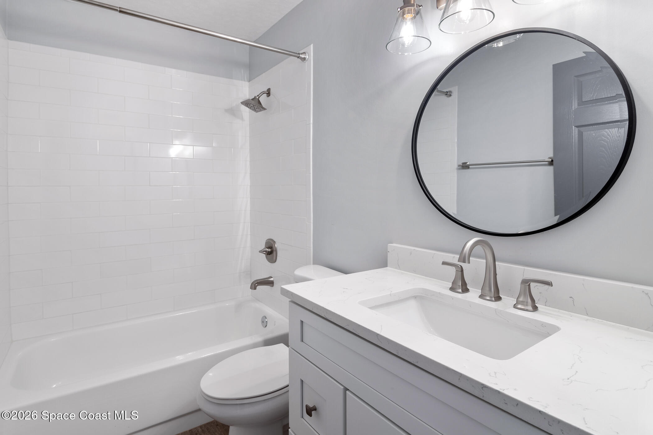 7667 North Wickham Road, Unit 1201 Melbourne, FL 32940 - Photo 16 of 29 Guest Bathroom