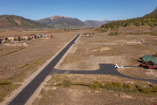 a view of a mountain with an outdoor space