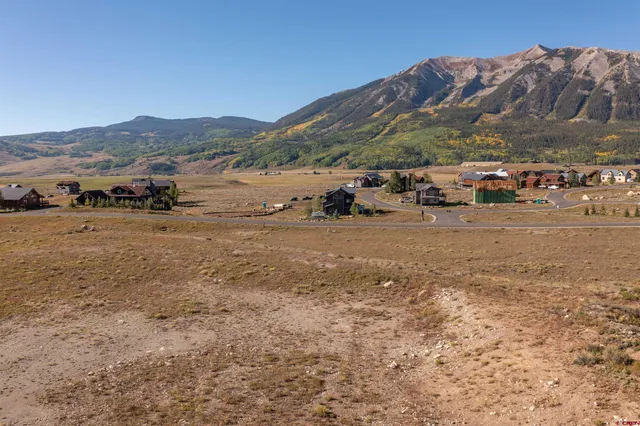 a view of a road with an ocean view