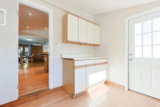 a backyard of a house with wooden floor